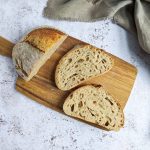 Loaf of sourdough bread on a cutting board